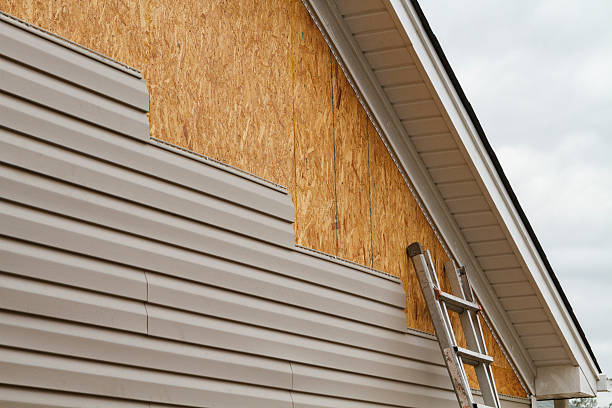 Professional Emergency Siding Repair technician working in Smithfield, PA